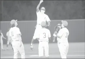  ??  ?? Billy Bailey catches a high thrown ball during the wrap up before the sixth inning of the Coahoma baseball varsity game against Sonora on Tuesday. Coahoma won the match 10-4.