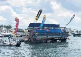  ?? COURTESY ?? Jay’s Sandbar Food Boat, a popular mobile restaurant on the water that sailed the Intracoast­al selling food to other boaters, sank in Fort Lauderdale after blowing a pontoon Sunday, the boat’s owner said.