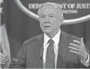  ?? SUSAN WALSH/AP ?? Attorney General Jeff Sessions meets reporters Thursday to talk about concerns about contacts with Russian officials.