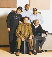  ?? Houston Cofield / New York Times ?? A new box set spotlights Isaac Hayes’ backup band, which included, clockwise from top left: James Alexander, Sidney Kirk, Willie Hall, Mickey Gregory and Harold Beane.