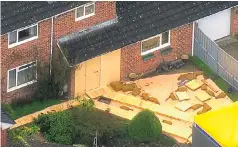  ??  ?? Sergei Skripal’s front door is boarded up yesterday and, right, Yulia Skripal, in red, with her father outside his Salisbury home