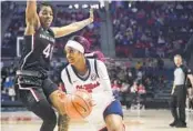  ?? ROGELIO V. SOLIS AP ?? Mississipp­i guard Myah Taylor (1) attempts to dribble past defense of South Carolina’s Kierra Fletcher.