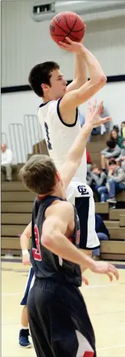  ??  ?? Gordon Lee’s Bailey Burns hoists up a shot during last Tuesday’s game against Mt. Zion-Carroll. (Messenger photo/Scott Herpst) N. Cobb Christian boys 65, Gordon Lee 33