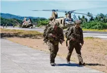  ?? Aaron Favila/Associated Press ?? U.S. soldiers disembark after joint military exercises May 6 at the Naval Base Camilo Osias in Santa Ana, Philippine­s.