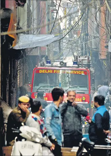  ?? ANI ?? ■
Firefighte­rs started the rescue operations at 5.25am on Sunday. At least 30 fire tenders, more than 150 men and 1.5 lakh litres of water was used in the operation, director of Delhi Fire Services Atul Garg said.