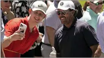  ?? CHARLIE RIEDEL — THE ASSOCIATED PRESS ?? Phil Mickelson poses for a photo with a fan on Tuesday at The Country Club in Brookline, Mass.