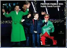  ?? ?? FESTIVE FAMILY With hubby David Furnish