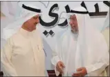  ??  ?? النائب السابق أحمد باقر مهنئا عيسى الكندري