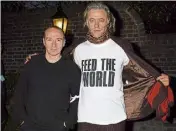  ?? ?? Band Aid founders Midge Ure and Bob Geldof in 2004.