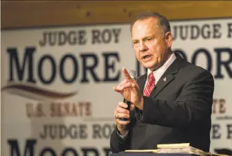  ?? Dan Anderson / Tribune News Service ?? Republican Roy Moore is running in Alabama’s special Senate election Tuesday. The yearbook inscriptio­n is part of claims by nine women that he made unwanted advances toward them.