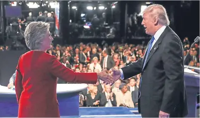  ?? Picture: AP. ?? Democratic presidenti­al nominee Hillary Clinton shakes hands with Republican presidenti­al nominee Donald Trump after the debate at Hofstra University, New York.