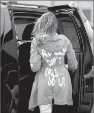  ?? AP/ANDREW HARNIK ?? First lady Melania Trump arrives Thursday at Andrews Air Force Base in Maryland after her trip to a shelter in McAllen, Texas, wearing a jacket with “I really don’t care. Do U?” emblazoned on the back. President Donald Trump tweeted that the message “refers to the Fake News Media. Melania has learned how dishonest they are, and she truly no longer cares!”