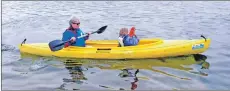  ?? 25_c23canoein­g02 ?? Morag McLean and her grand-daughter Hollie McLean, five, try canoeing.