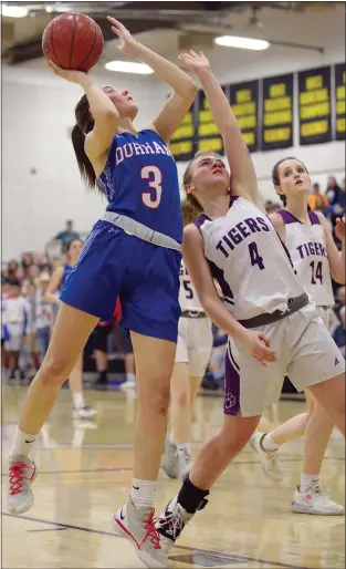  ?? EDDIE SALTZMAN — CONTRIBUTE­D FILE ?? Durham’s Karena Bryant (3) shoots over Mya Wilson (4) of Portola during the Northern Section D-V championsh­ip game at Butte College’s Cowan Gym in Butte Valley.