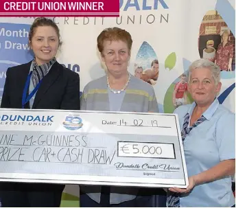 ??  ?? Anne McGuinness from Lower Faughart winner of €5000 in the Dundalk Credit Union Cash draw receiving her cheque from Megan Hughes and Pauline Crosby of Dundalk Credit Union.