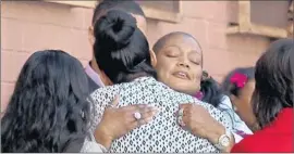  ?? Luis Sinco
Los Angeles Times ?? WENDY WOMACK-SMITH, mother of San Bernardino shooting victim Sierra Clayborn, is comforted by friends and relatives after her daughter’s funeral.