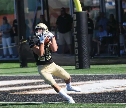  ?? File photo by Ernest A. Brown ?? Bryant senior wide receiver/kick returner Vinny Nisivoccia (25) is one of two Bulldogs who are preseason all-NEC selections. Nisivoccia is coming off a campaign where he caught a team-high 50 passes for 691 yards and seven touchdowns.