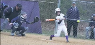  ?? STAFF PHOTO BY AJ MASON ?? McDonough third baseman Haley Arnold unloads a swing for an eventual two-run double in the bottom of the fifth inning of Friday’s 9-2 victory over the visiting La Plata Warriors in a SMAC Potomac Division softball contest in Pomfret. Arnold was 2 for 3...
