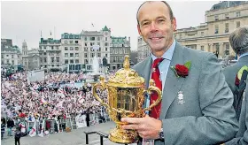  ??  ?? The glory days: Sir Clive Woodward parades the World Cup trophy in 2003