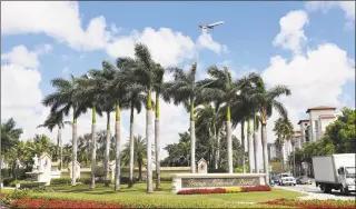  ?? Michele Eve Sandberg / AFP via Getty Images ?? This Apr. 3, 2018, file photo shows the entrance of Trump National Doral in Miami, Fla. President Donald Trump dropped plans to hold an internatio­nal summit at his Doral resort in Florida after realizing “it looks lousy” to steer business to his own property, his acting chief of staff said Sunday.