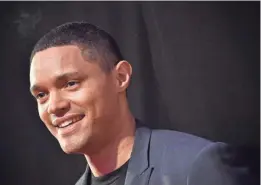  ?? GETTY IMAGES ?? Trevor Noah, host of Comedy Central’s “The Daily Show,” shares stories of his childhood in South Africa in his memoir, “Born a Crime.”