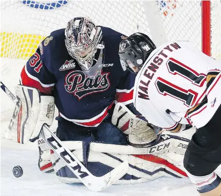  ?? LEAH HENNEL ?? Hitmen winger Beck Malenstyn tries to score on Regina Pats goalie Tyler Brown. As the Hitmen prepare for Game 3, coach Mark French says his team knows what they have to do: “There’s probably no secret around the recipe of it, it’s time and space and...