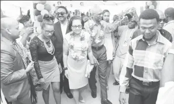  ??  ?? President David Granger receives a warm greeting from supporters as he arrives at the PNCR Congress yesterday.