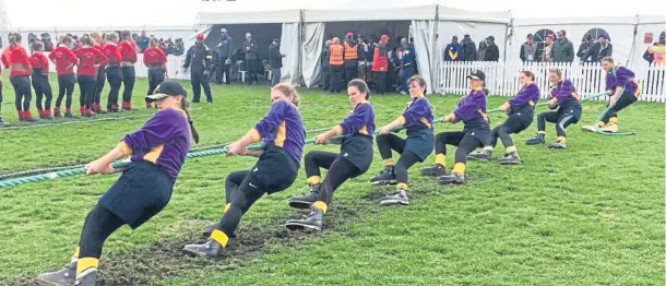  ??  ?? DETERMINED: The Ayrshire ladies in action on their way to becoming 2018 world champions in the 500kg Open class in South Africa