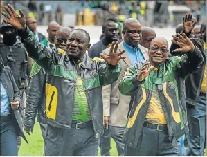  ?? Picture: AFP ?? TOP MEN: President Jacob Zuma, right, and Deputy President Cyril Ramaphosa arrive at Orlando Stadium in Soweto for the ANC's 105th anniversar­y celebratio­ns