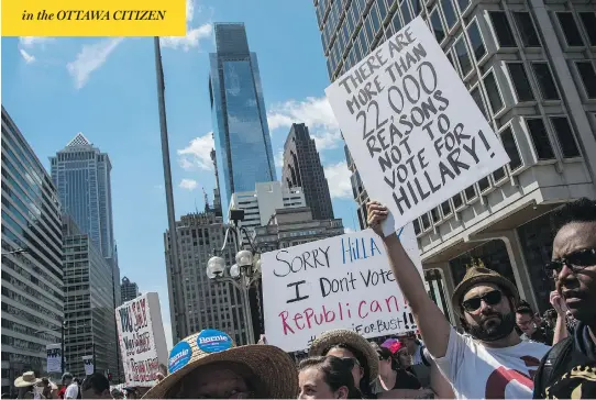  ?? NICHOLAS KAMM / AFP / GETTY IMAGES ?? Ahead of the Democratic National Convention in Philadelph­ia, Bernie Sanders supporters hold protests against Hillary Clinton, the party’s nominee for president. The Clinton campaign’s effort to portray the Democrats in a different light from the...