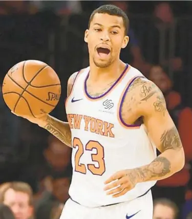  ?? GETTY ?? Trey Burke concentrat­es on his play on court with big decisions coming up soon off the court.