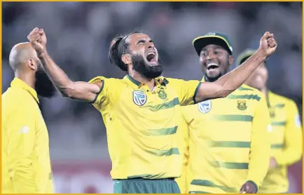  ??  ?? South Africa leg-spinner Imran Tahir celebrates the wicket of Colin de Grandhomme of New Zealand at Eden Park yesterday.