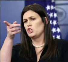  ?? SUSAN WALSH — THE ASSOCIATED PRESS ?? White House press secretary Sarah Huckabee Sanders calls on a reporter during the daily briefing at the White House in Washington, Wednesday. Sanders was asked about North Korea, the state visit of French President Emmanuel Macron and other topics.