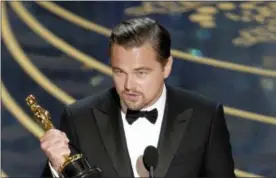  ?? PHOTO BY CHRIS PIZZELLO — INVISION — AP, FILE ?? In this file photo, Leonardo DiCaprio talks about climate change as he accepts the award for best actor in a leading role for “The Revenant” at the Oscars in Los Angeles.