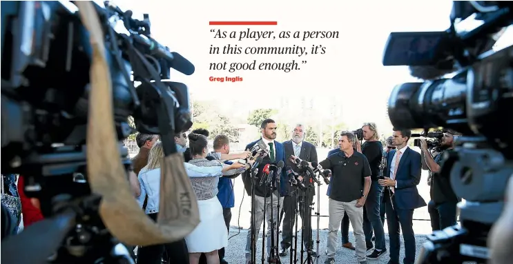  ?? GETTY IMAGES ?? A huge media contingent surrounds Greg Inglis after the would-be Australian captain was charged with a drink-driving offence.