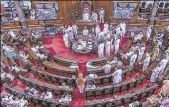  ?? PTI ?? Opposition MPs protest over Pegasus snooping row, in Rajya Sabha on July 26.