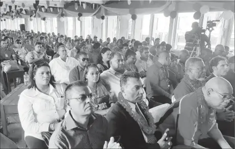  ??  ?? A section of the gathering at the opening of the PPP/C Congress yesterday; seated in the front row from left are: former minister Manzoor Nadir, Peter Ramsaroop, and former minister Juan Edghill and former PM Sam Hinds.