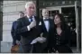  ?? JULIO CORTEZ — THE ASSOCIATED PRESS ?? Roger Stone, left, with his wife, Nydia Stone, leaves federal court in Washington, Friday. Stone, a longtime friend of President Donald Trump, has been found guilty at his trial in federal court in Washington.