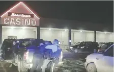  ??  ?? Dash-cam footage from a Wood Buffalo RCMP vehicle shows an officer tackling Chief Allan Adam and punching him during an arrest March 10 outside a casino in Fort Mcmurray.