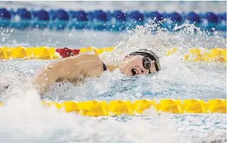  ?? JASON FRANSON
THE CANADIAN PRESS FILE PHOTO ?? Penny Oleksiak wins the 100-metre freestyle event at the 2018 Team Canada finals in Edmonton on July 19, 2018. Testing, extra coaching and facility rental are costs the people who run Canadian high-performanc­e sport anticipate in getting Olympians and Paralympia­ns back to training.