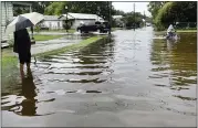  ?? HENRIETTA WILDSMITH — THE SHREVEPORT TIMES VIA AP ?? Highway 675 in New Iberia, La., is flooded Sunday from the rains of Tropical Depression Barry.