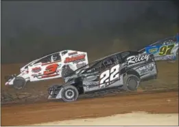  ?? COURTESY MARK BROWN/RYAN KARABIN KUSTOM KEEPSAKES ?? Modified action between Jeremy Wilder (22), Marc Johnson (3J) and Bobby Hackel (9) at Albany-Saratoga Speedway Friday night.