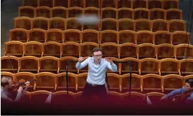  ?? Joe Klamar/AFP/Getty Images ?? ‘Knowing another world, how other people work and having a completely different role is healthy.’Daniel Harding rehearses at Musikverei­n music hall in Vienna in May 2021. Photograph: