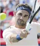  ?? PAUL CHIASSON/CANADIAN PRESS ?? Roger Federer could win his third Grand Slam title of the year at the U.S. Open.