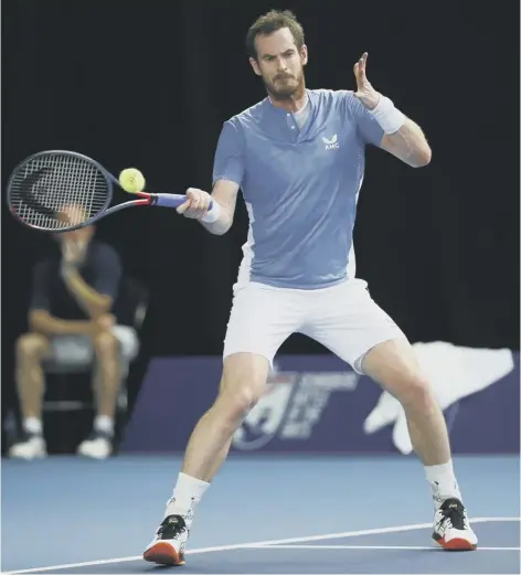  ??  ?? 0 Andy Murray hits a forehand during his win over Liam Broady at the Schroders Battle of the Brits tournament in Roehampton.