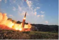  ?? - Defense Ministry/Yonhap/via Reuters ?? MILITARY DRILL: Caption South Korean troops fire Hyunmoo Missile into the waters of the East Sea at a military exercise in South Korea September 4, 2017.