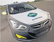  ?? AFP ?? This Royal Automobile Club of Western Australia handout photo received yesterday shows the world’s first ‘attention powered car’ with a driver wearing a headset designed to raise awareness about the deadly impact of inattentio­n on the road.