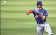  ?? Mark Brown / TNS ?? Francisco Lindor of the New York Mets makes the throw to first base for the out in the fourth inning against the Miami Marlins in a spring training game at Roger Dean Chevrolet Stadium on March 1 in Jupiter, Fla.