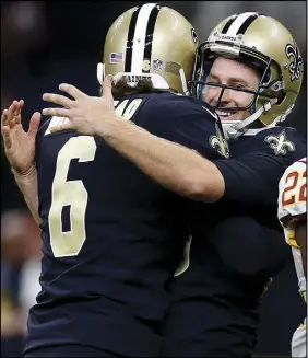  ?? Ap photo ?? New Orleans Saints kicker Wil Lutz celebrates his game winning field goal with holder Thomas Morstead (6) against Washington on Sunday.