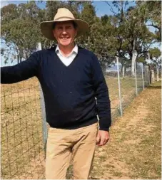  ?? PHOTO: CONTRIBUTE­D ?? BOUNDARY SECURE: Stanthorpe farmer Brent Finlay has reclaimed parts of his property from the clutches of wild dogs by installing a Waratah exclusion fence.